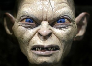 Gollum, a special effects creature from the movie 'Lord of the Rings', is on display at the annual four-day Comic Con convention in San Diego, July 18, 2003. Thousands of fans from around the world gather to peruse a collection of comic books and industry related sci-fi, video and motion picture fantasy products. REUTERS/Mike Blake PP03070072 MB - RTRTBV